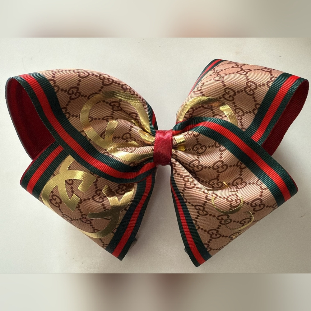 Gucci Women's Gold and Tan Patterned Bow Hair Clip
